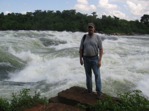 I'm standing at Bujagali Falls on the Nile River, just a few miles north of the Nile's source, Lake Victoria.